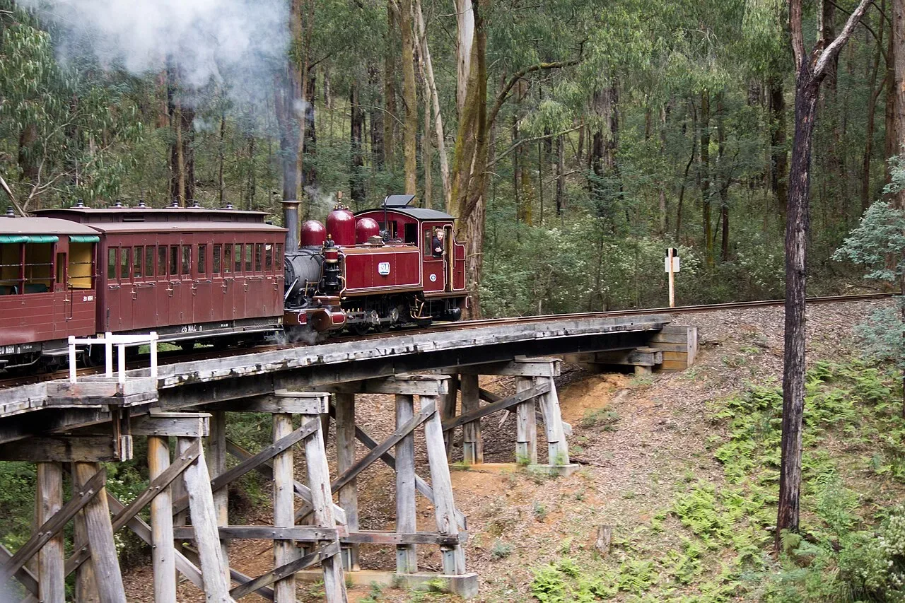Puffing Billy steam train crossing a Dandenong Ranges trestle bridge